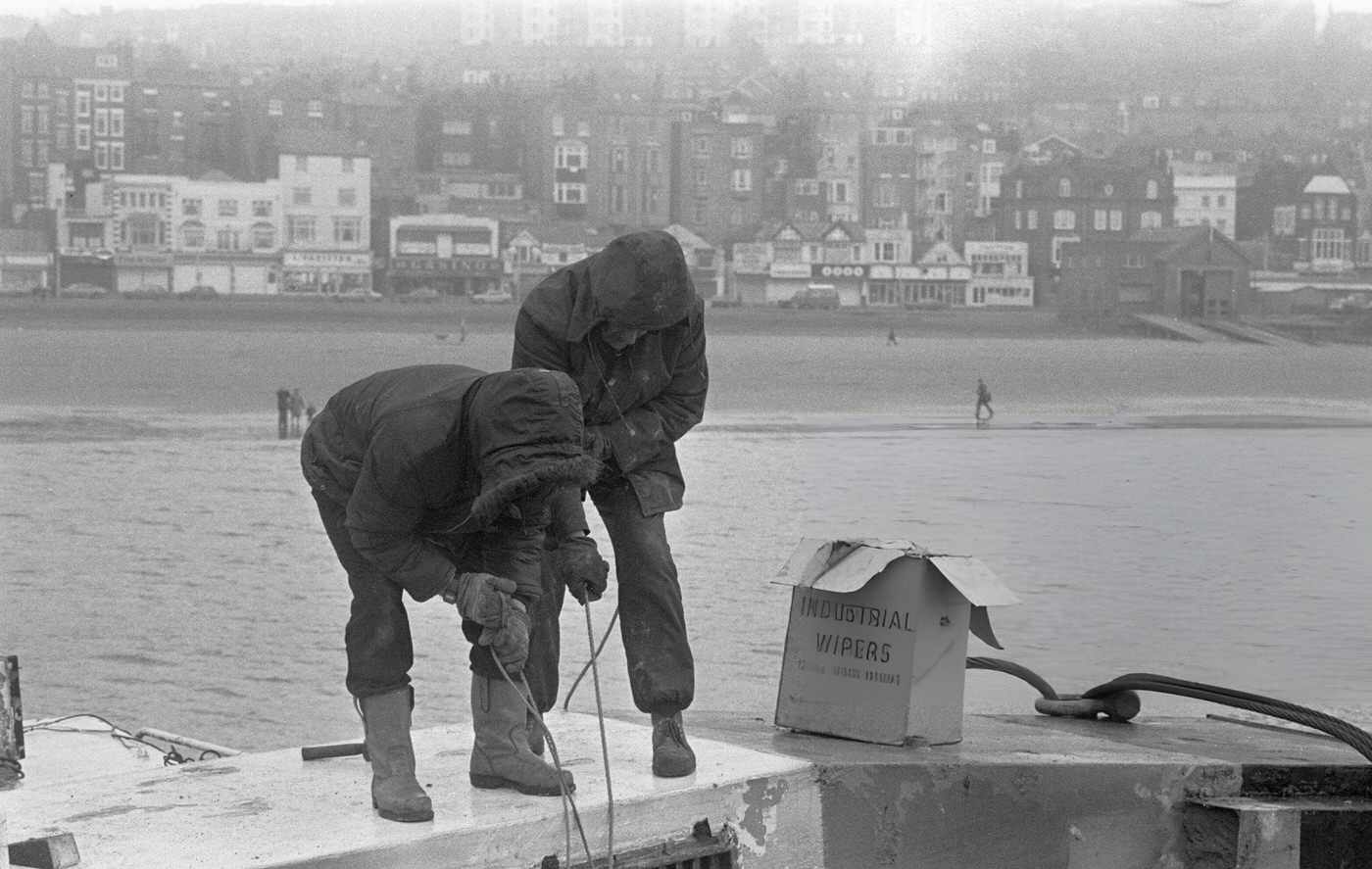 Salvage workers board the J Marr fishing trawler Navena, 1980s.