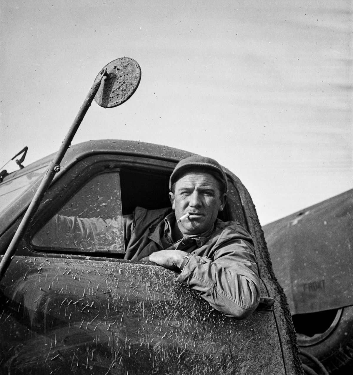 Private First Class Raymond E. Waller of Dayton, Ohio, a trucker in civilian life.