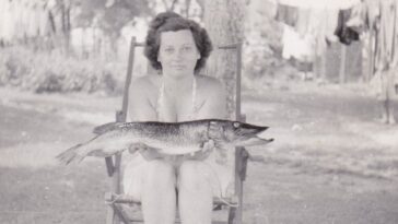 Women Holding their Fish