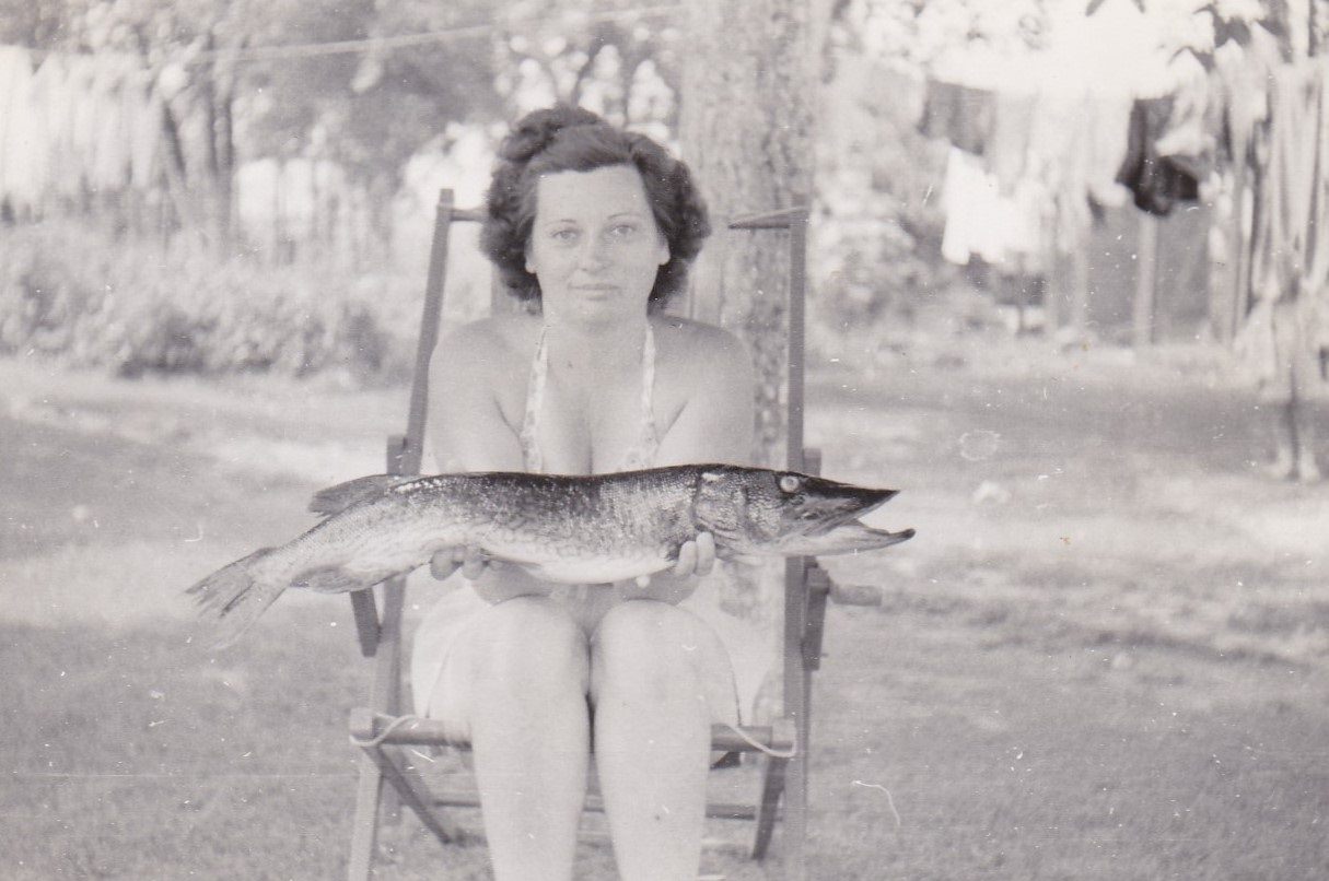Women Holding their Fish