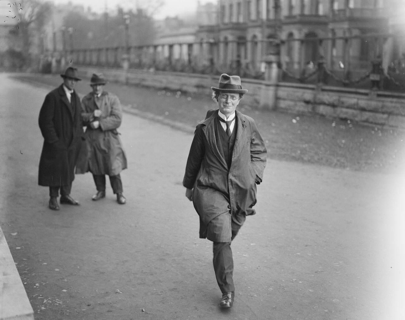 The fateful session of the Dail Eireann at the new University College, Dublin with the speaker, Professor John MacNeil arriving, 1921.