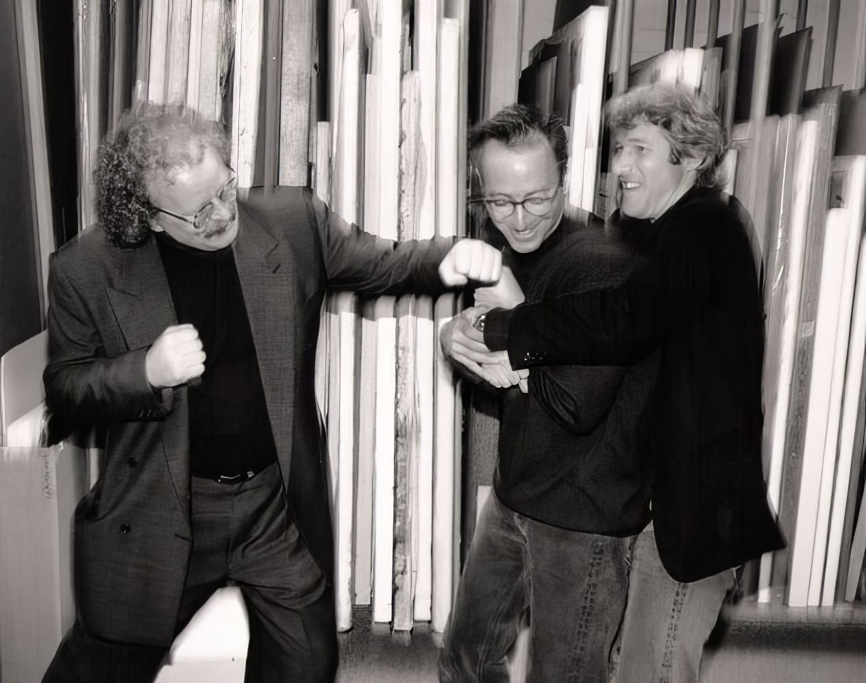 Gallery owner David Fahey horse-playing around with photographer Herb Ritts and Richard Gere.