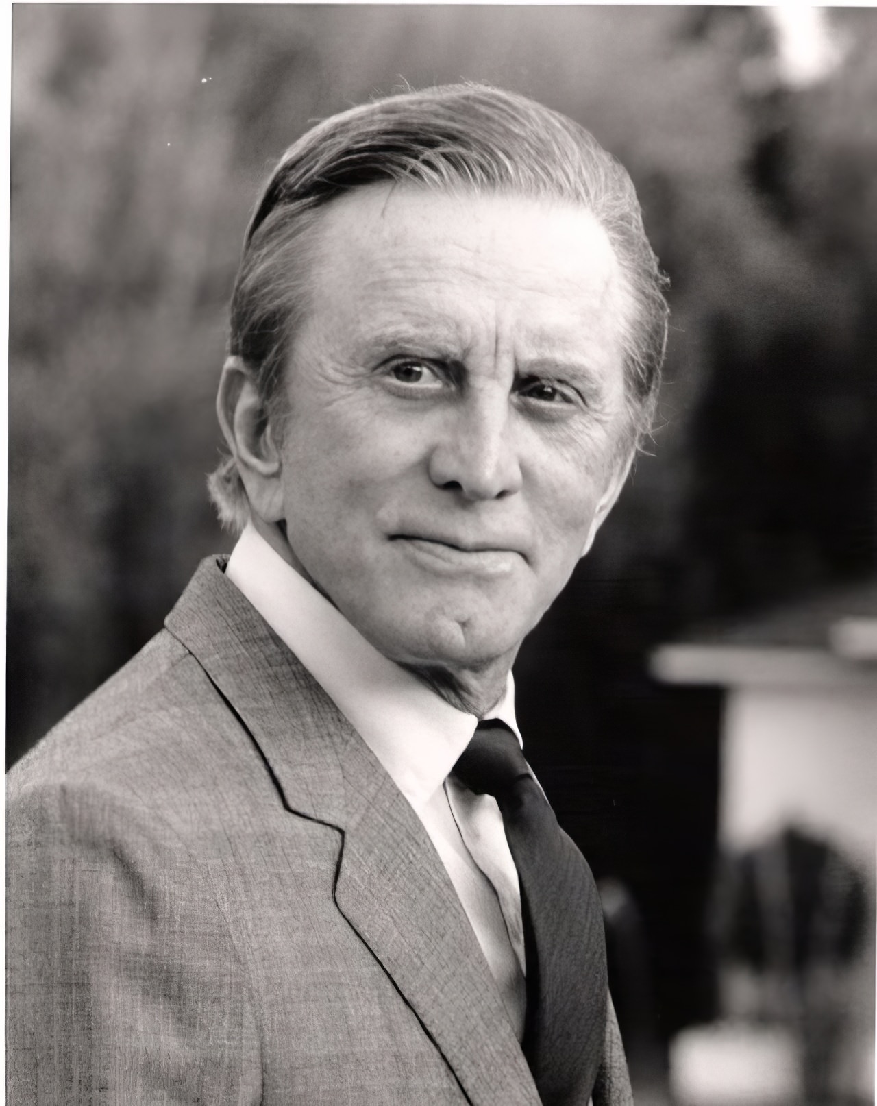 Kirk Douglas photographed on the terrace of author Sidney Sheldon's Beverly Hills home.