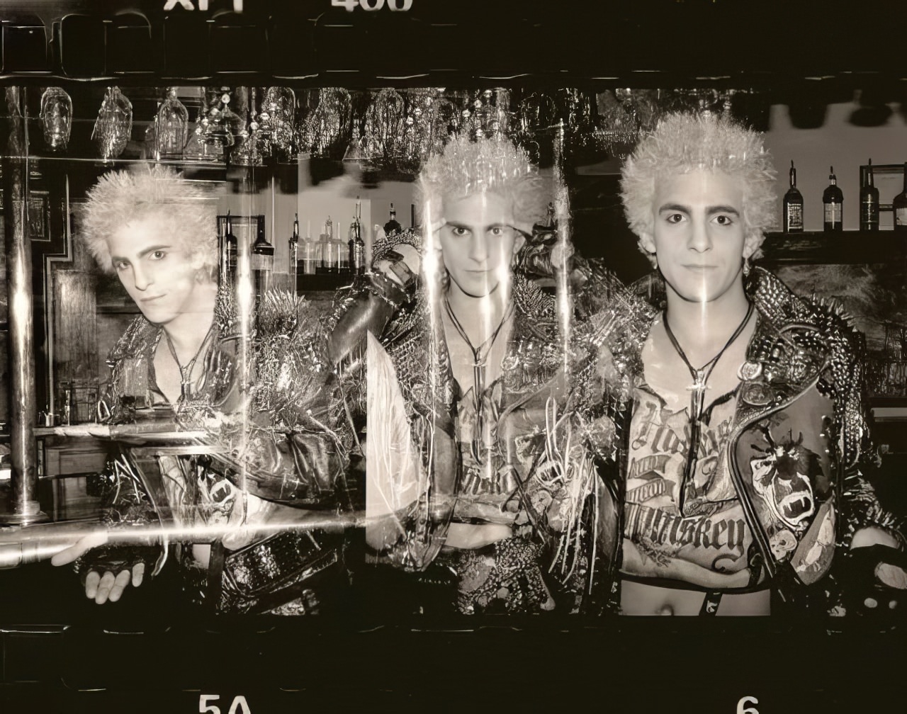 An in-camera triple exposure of a club kid downtown.