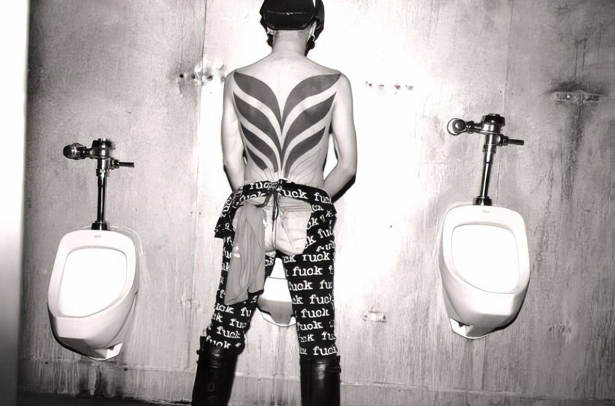 This young man, with five rings in his foreskin, died of AIDS, his wings unfinished.