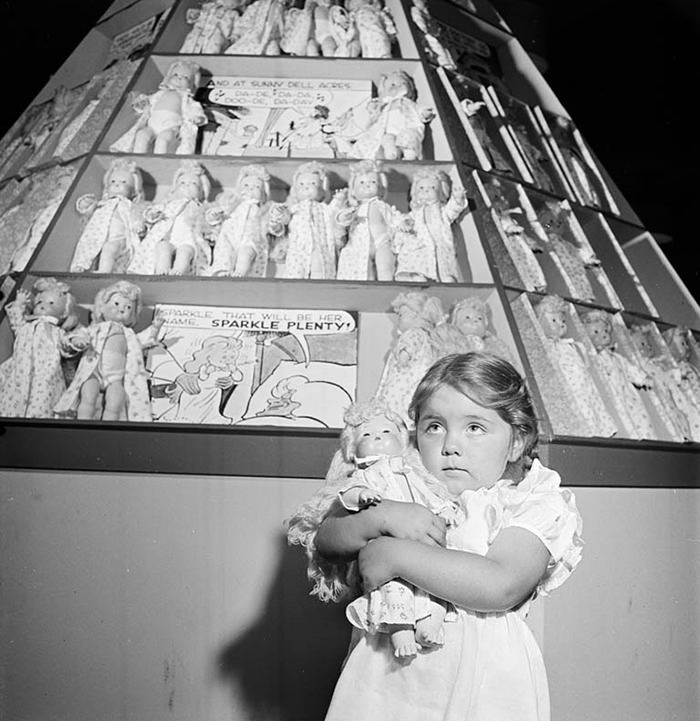 A girl with dolls, 1947.