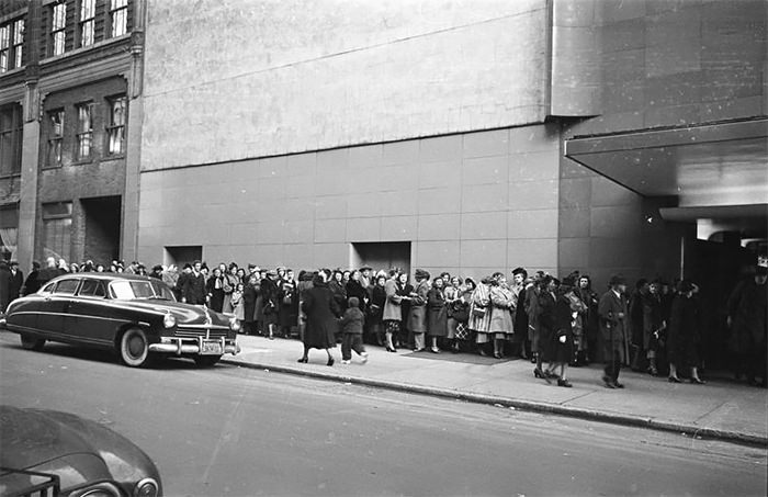 An audience waiting in line to get into a recording of "Grand Slam".