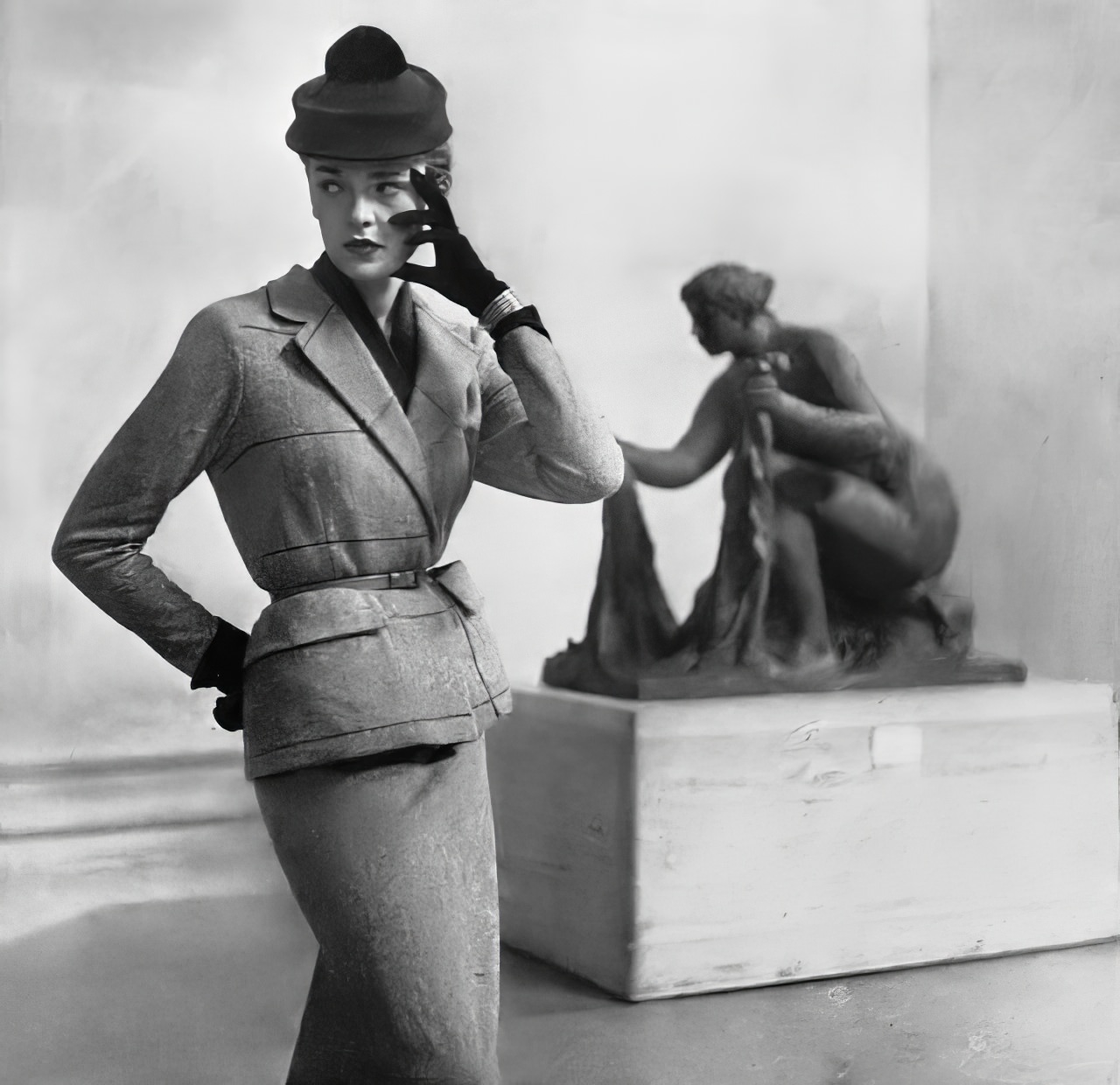 Susan Abraham in a barleycorn jersey tweed suit, 1951.