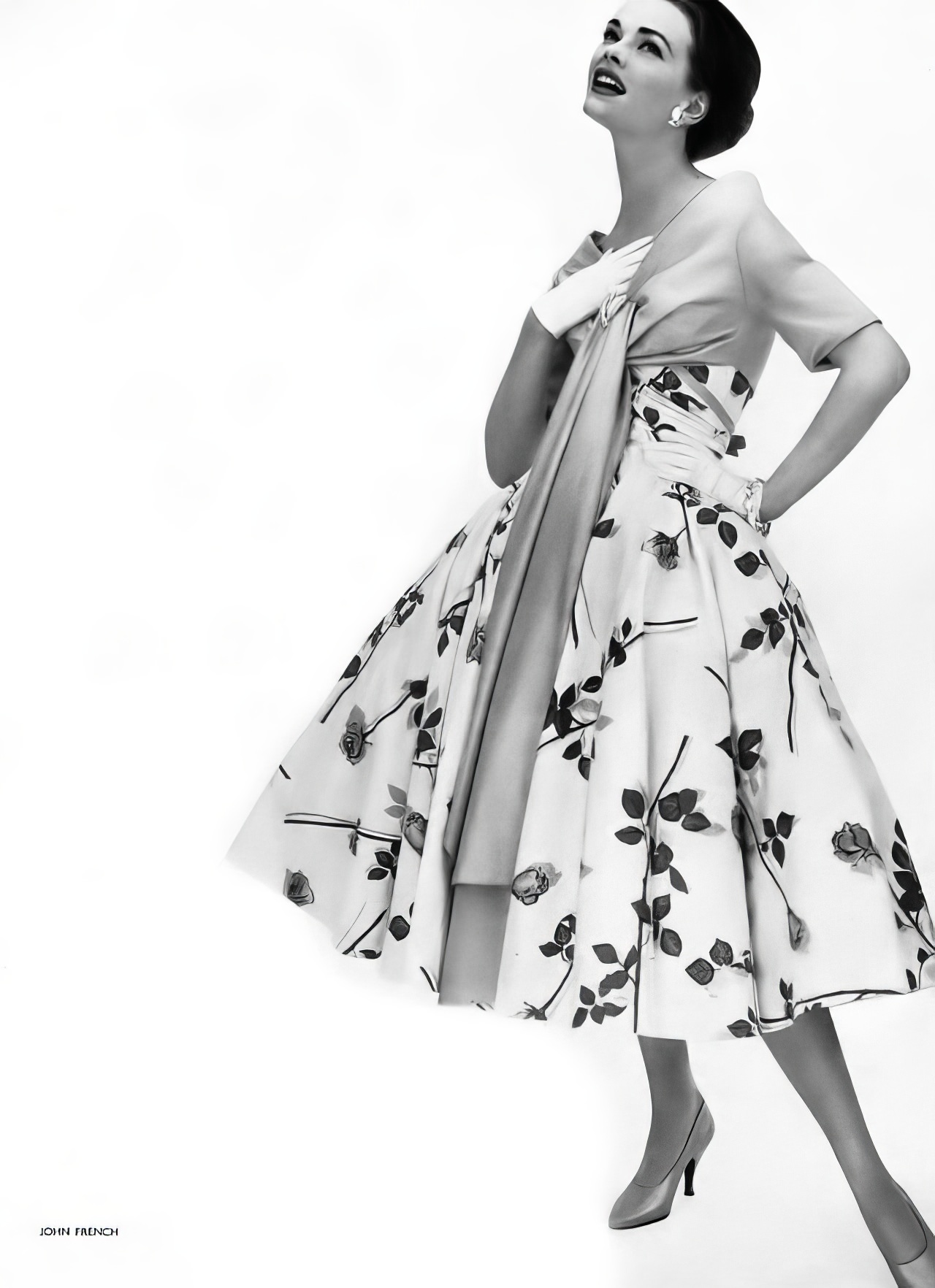 Susan Abraham in a short evening dress of cotton, 1957.