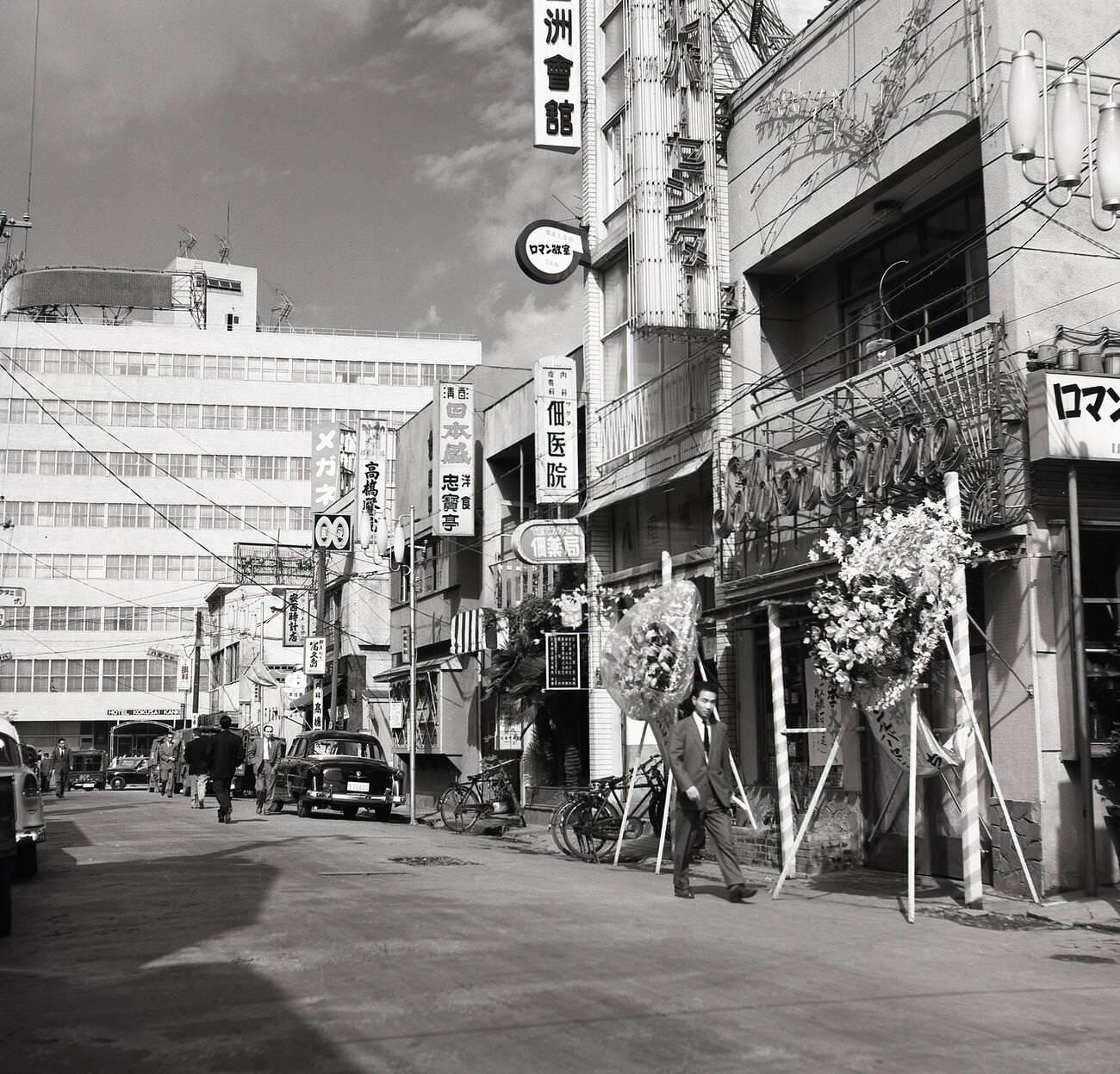 A ground level retail stores in the old town of Tokyo, 1950s.