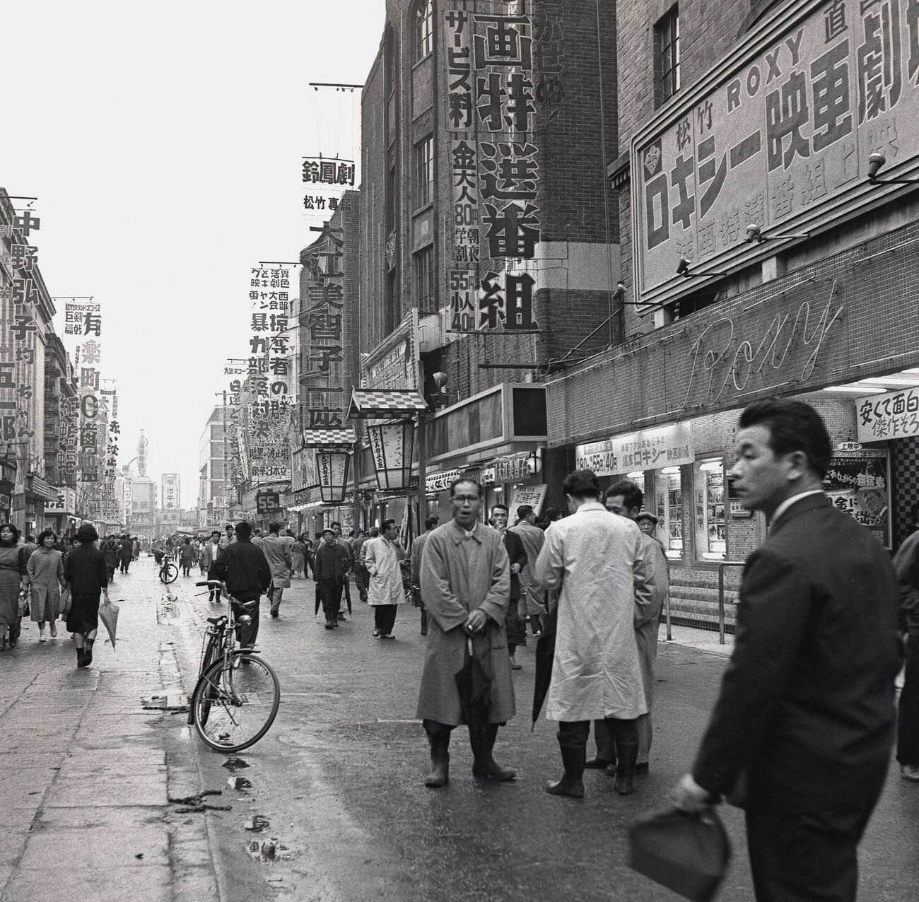 An exterior view down a pedestrianised city centre street in Tokyo, 1950s.