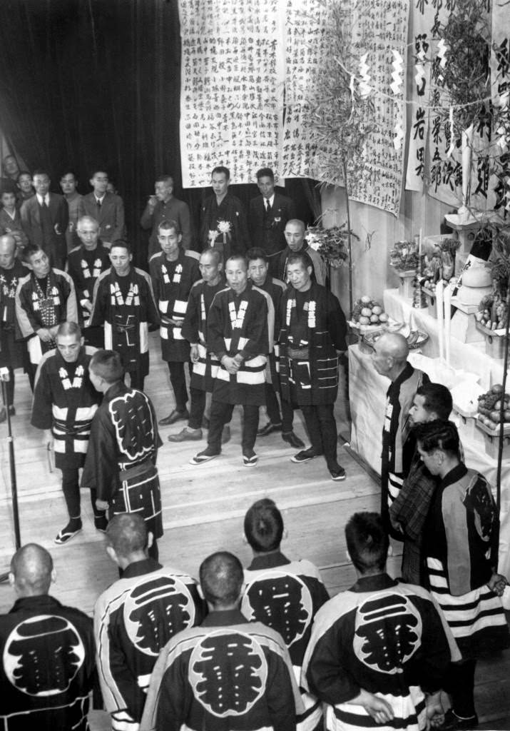 Gangsters, “Japanese style,” at ceremony inducting the new '“boss'” as head man of all the different factions in Tokyo, 1946.