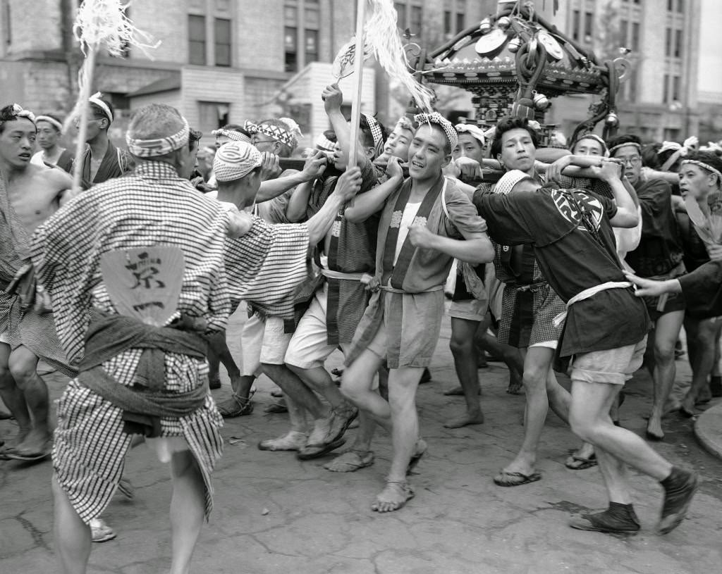 These excited young men are taking part in a festival in the Konda district of the city of Tokyo, 1949.
