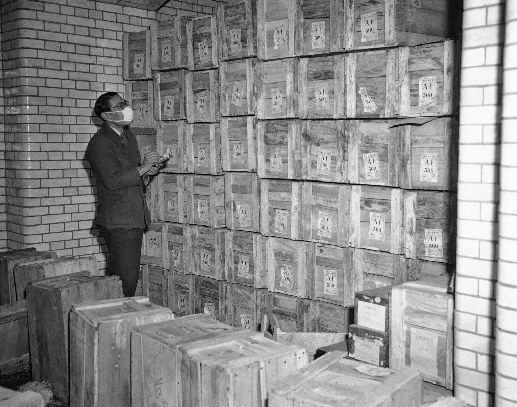 View inside the vaults in the Bank of Japan in Tokyo, 1947, as new yen is stored in boxes until called into circulation by the government.