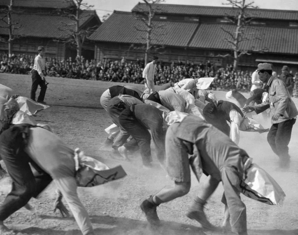 The Potato Race is underway as the contestants, employees of the Imperial household, race toward the finish line in Tokyo, 1947.
