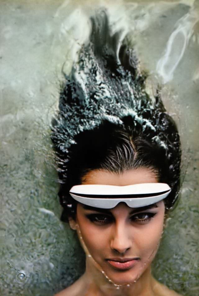 Veronica Hamel is wearing sunglasses by Sea & Ski, 1965.