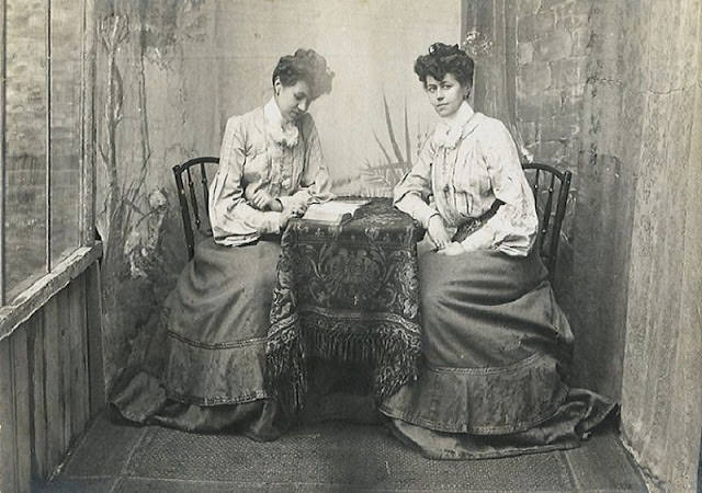 A young girl posing in an elegant Dress, 1890s