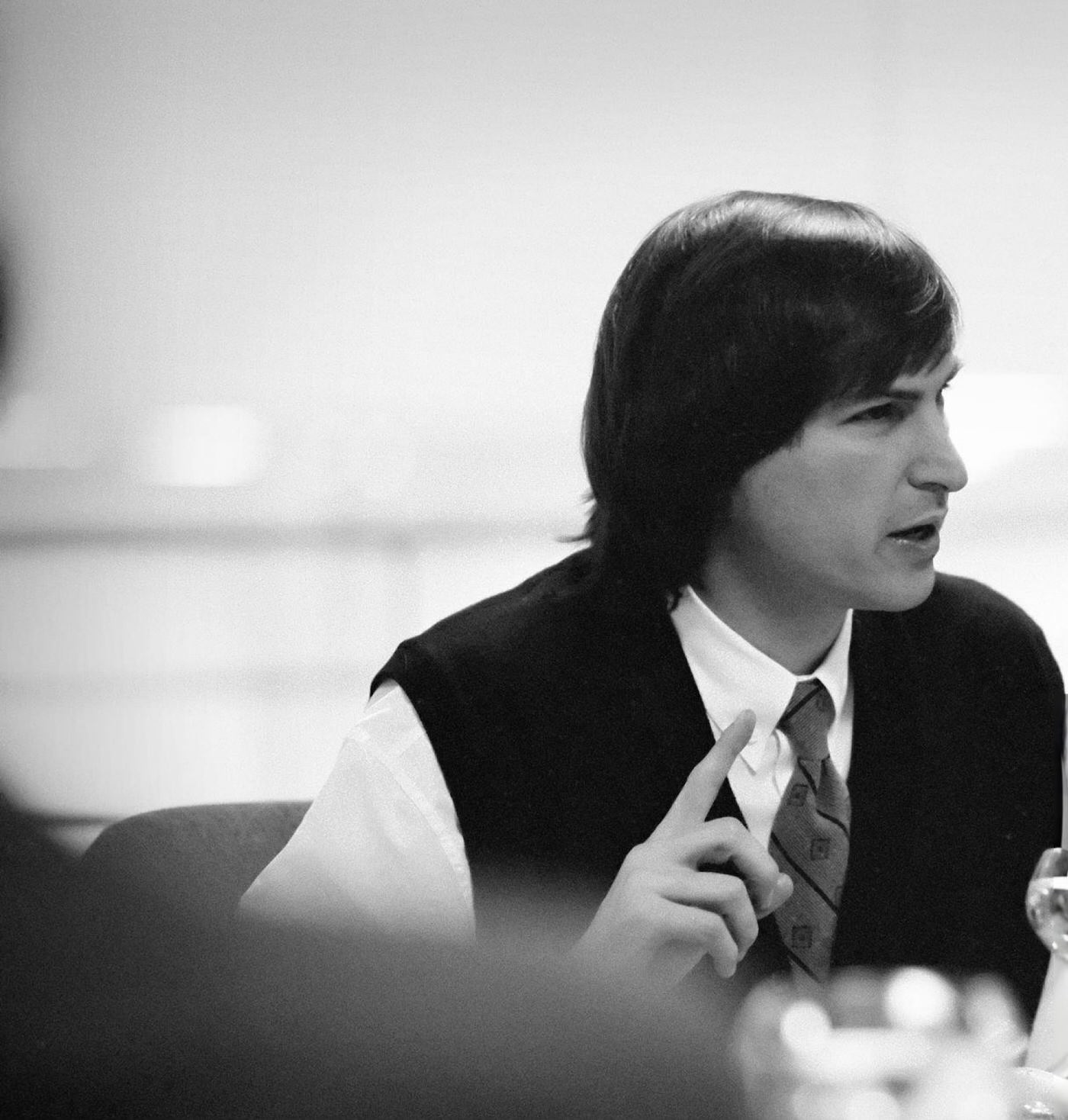 Steve Jobs in a meeting with Canon CEO Fujio Mitarai, 1989.