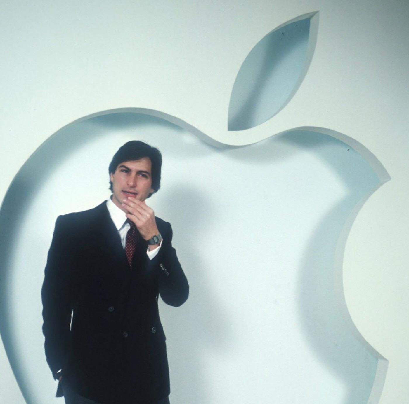 Steve Jobs posing at Apple Computer Co., 1982.