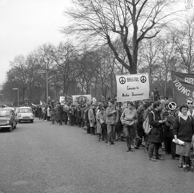 A long column of ban the bomb marchers arrive at Hyde Park, London. The march had started from the Atomic Weapons Research Establishment at Aldermaston, 1963.