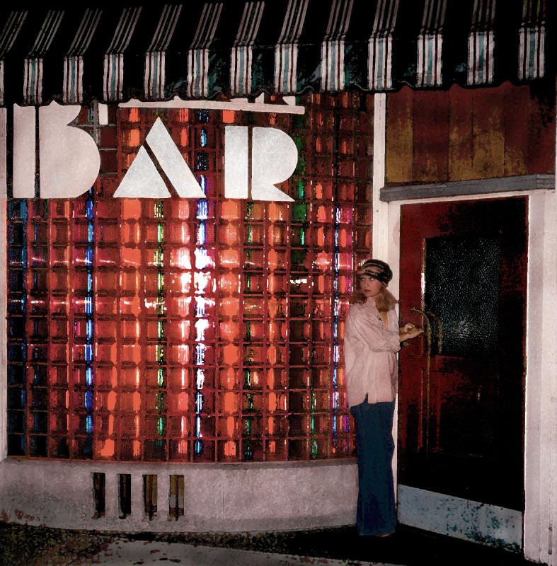Lynn with flag, 1970s.