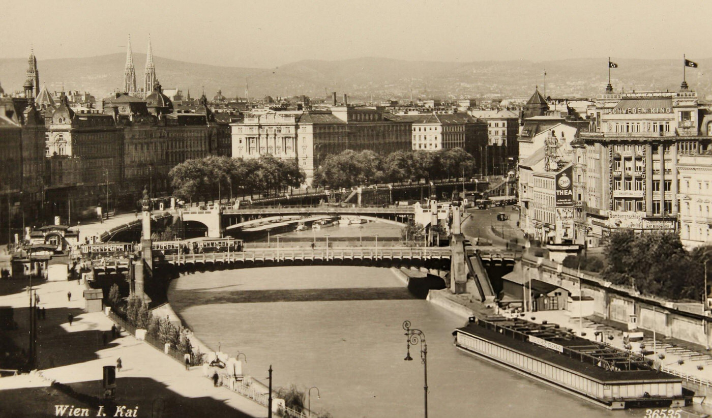 Overlooking the Danube Canal with the Municipal Strombad upriver towards the Hotel Metropol, Vienna, 1930.