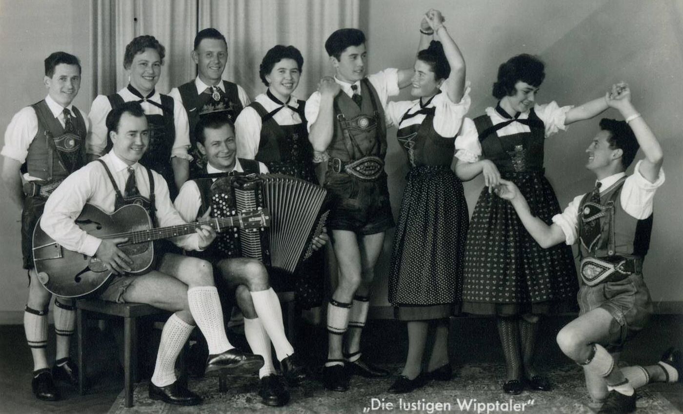Traditional Austrian national dancers and band in Innsbruck, Austria. "The Funny Wipptaler".