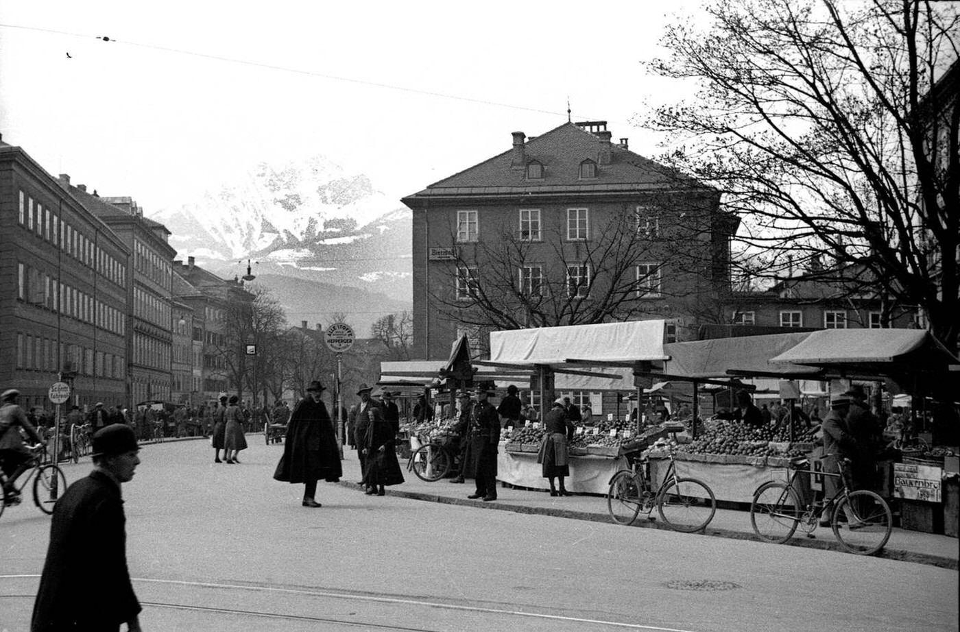 Street scene and market in Innsbruck, Austria, 1934.