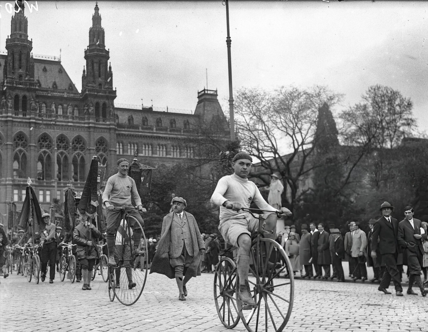 Parade of cyclists at Vienna City Hall, 1930s.
