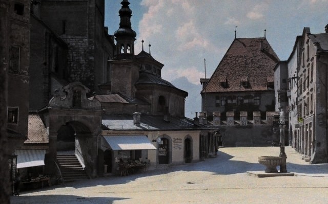 A mostly empty street and plaza in Hall in Tirol, Austria, 1929.