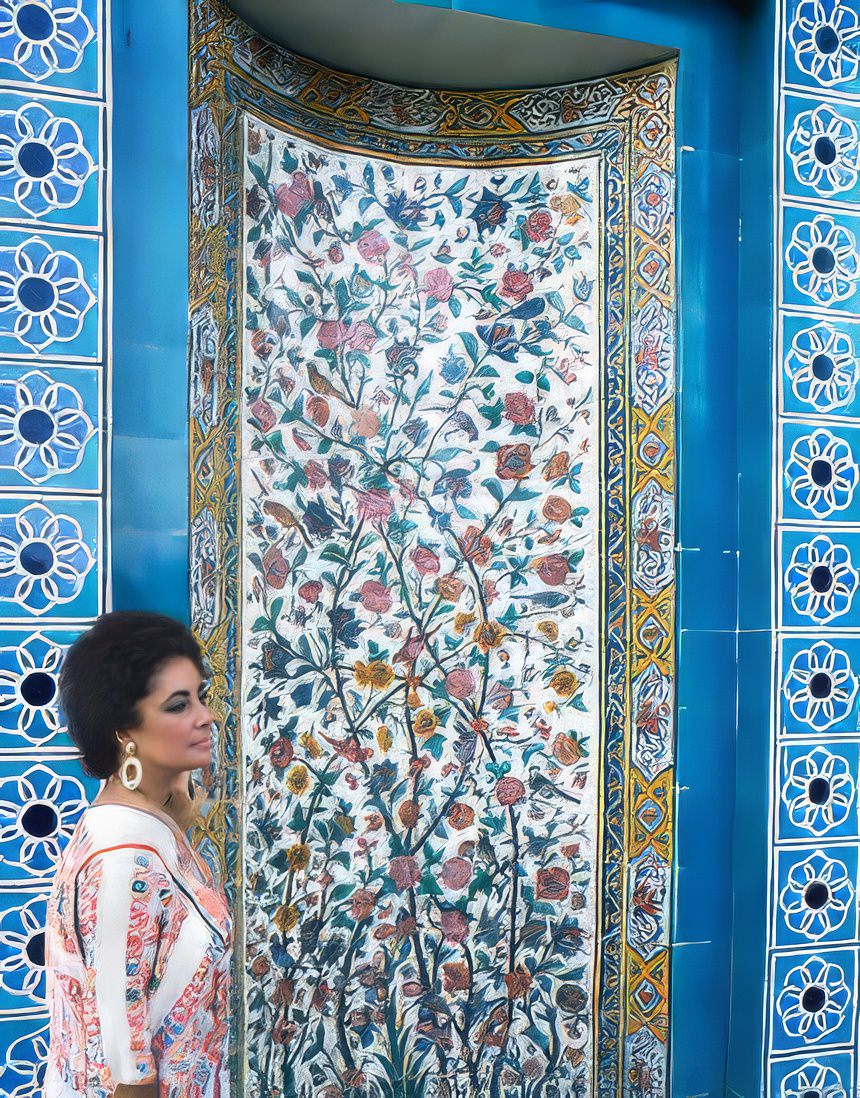 In profile in front of dazzling mosaic and tile work, Taylor stands by the tomb of the poet Sa’di