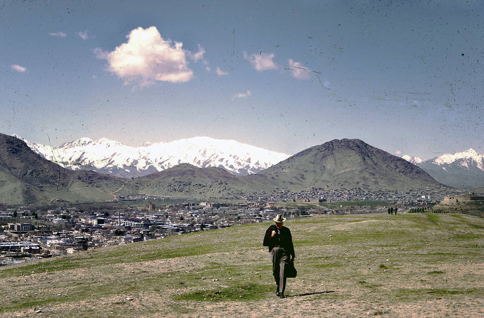 Dr. Bill Podlich on a hillside in Kabul.