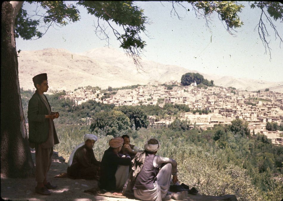 A group of Afghan men look out over Istalif, about 18 miles northwest of Kabul, which was a centuries-old center of pottery making as well as other tourist attractions.