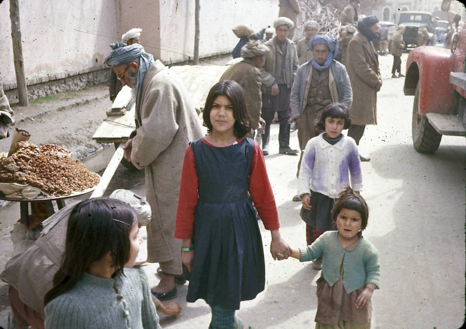 Sisters pose for a photograph in Kabul.