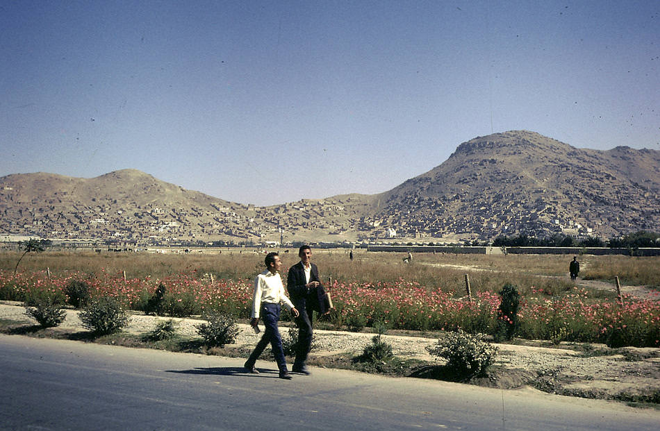 Young Afghans walking home.