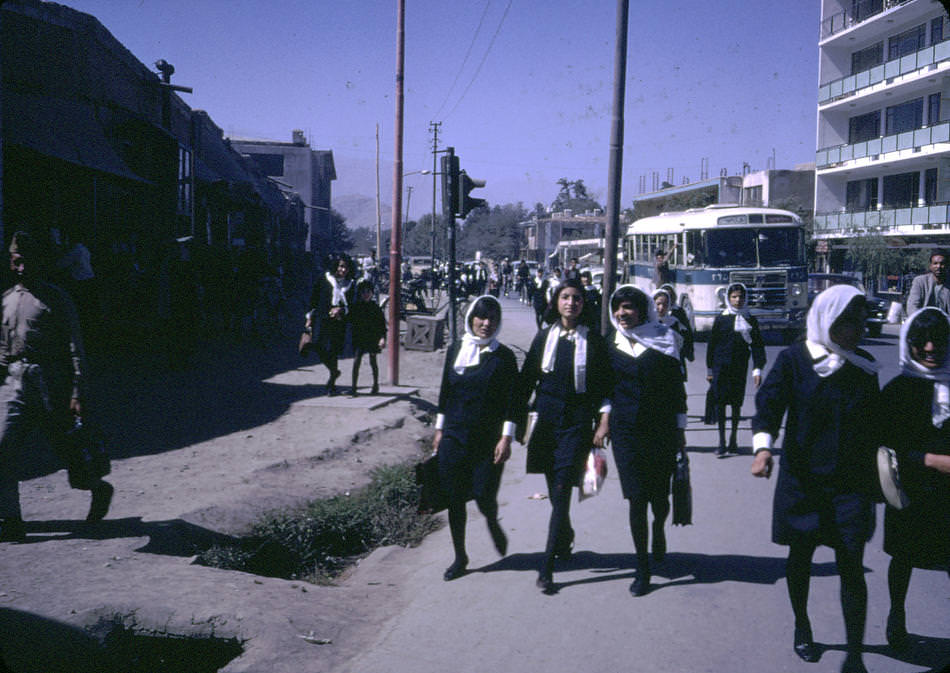 Afghan girls coming home from school.