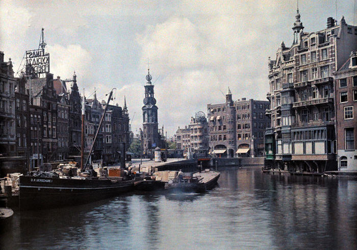 Crafts in Amsterdam's canal carrying goods and people, 1930s.