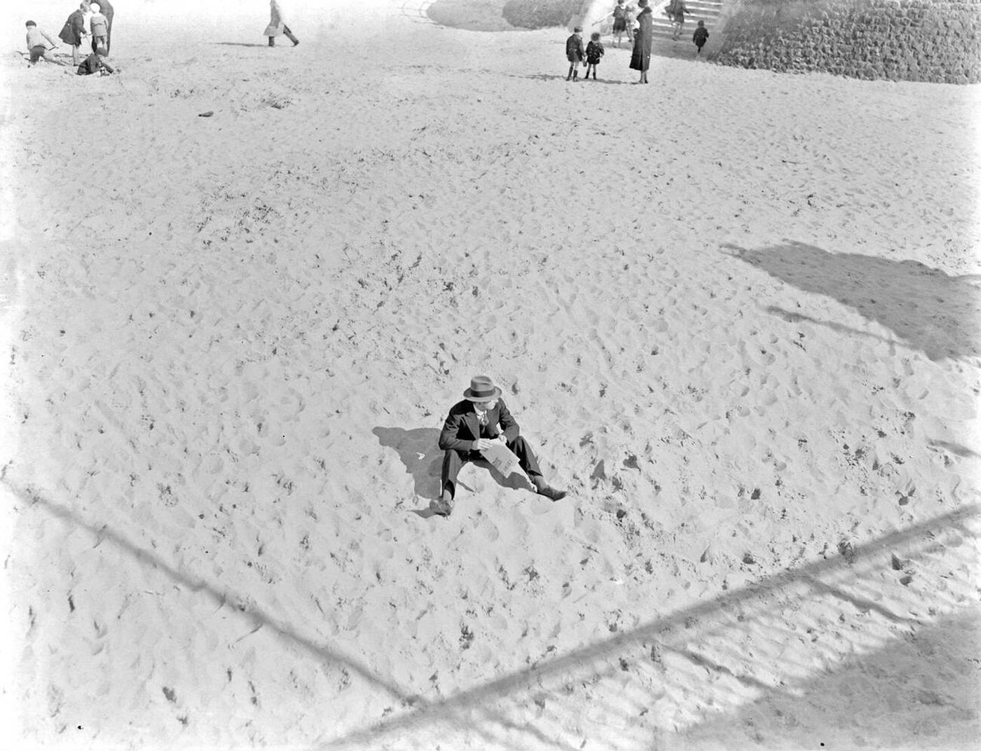 A gentleman on the deserted beach of Scheveningen, 1930s.