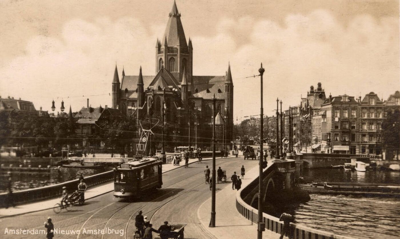 New Amstel Bridge, Amsterdam, Holland, with St Willibrord Church, 1930s.