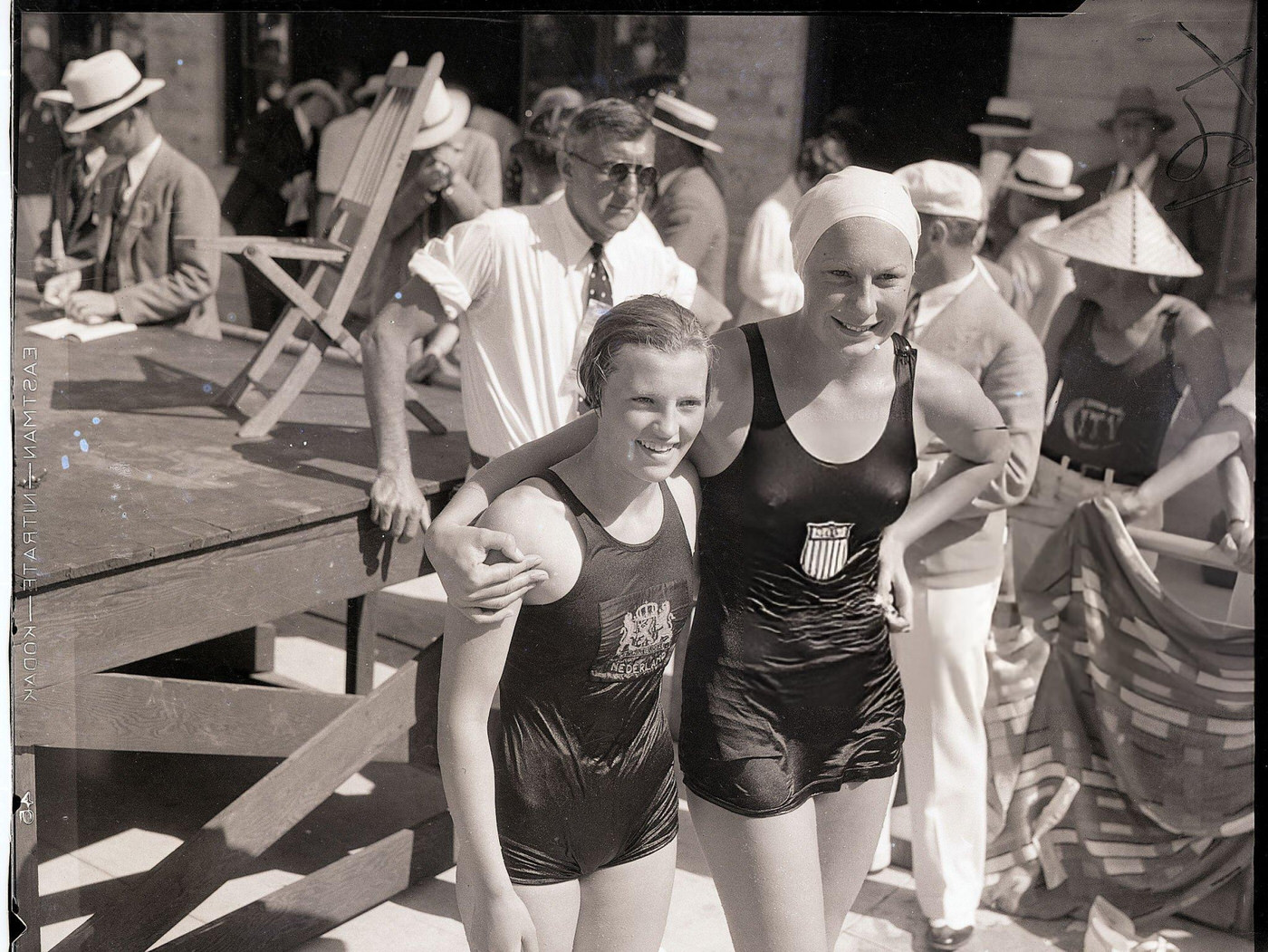 Olympic Swimmers Helene Madison and Williemijntje Den Ouden embrace at the Los Angeles Olympic Games, 1932.
