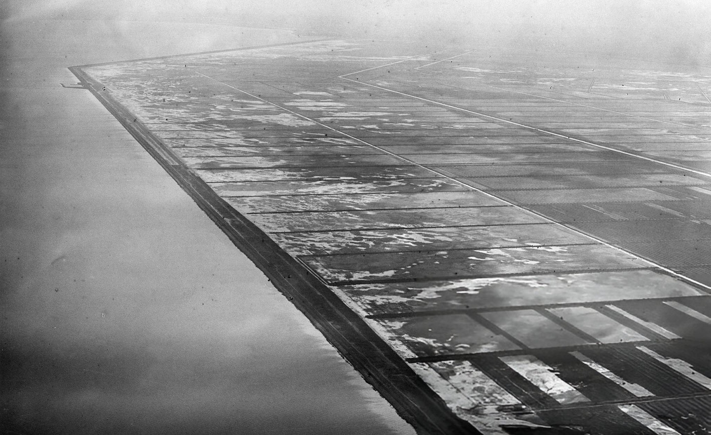 Holland The draining of the Zuiderzee, aerial view of the first artificial levees, 1931.