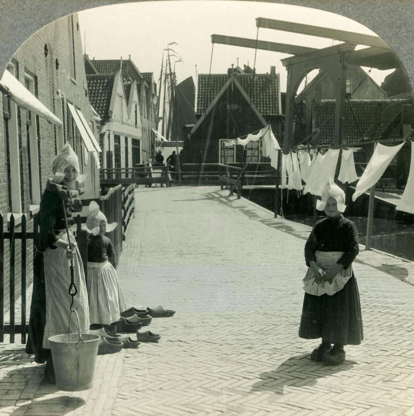 Washday in Volendam, Holland - Shoes Large and Small and Some Who Wear Them, 1930s.