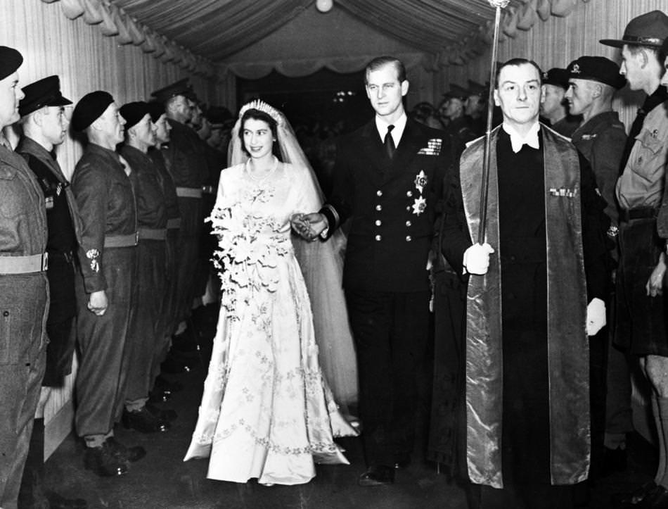 Britain's Princess Elizabeth and her husband the Duke of Edinburgh are seen leaving Westminster Abbey, London, on Nov. 20, 1947, following their wedding service.