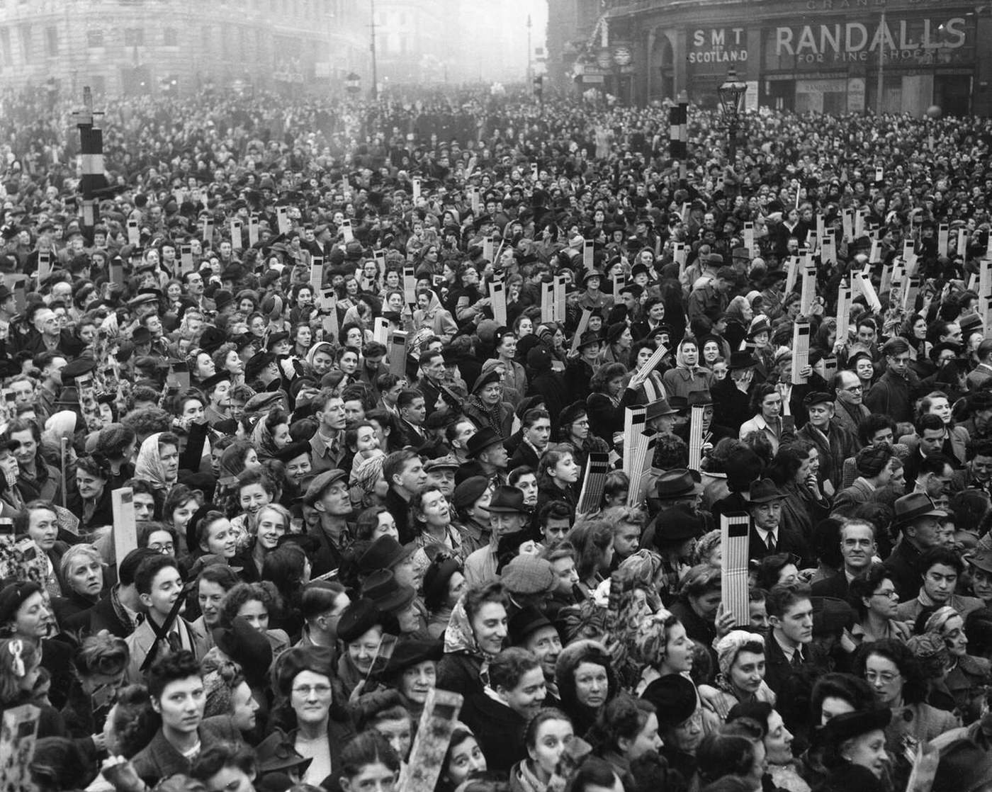 Crowd in Trafalgar Square looking through periscopes at the royal wedding of Princess Elizabeth to Lieutenant Philip Mountbatten, Duke of Edinburgh, 1947.