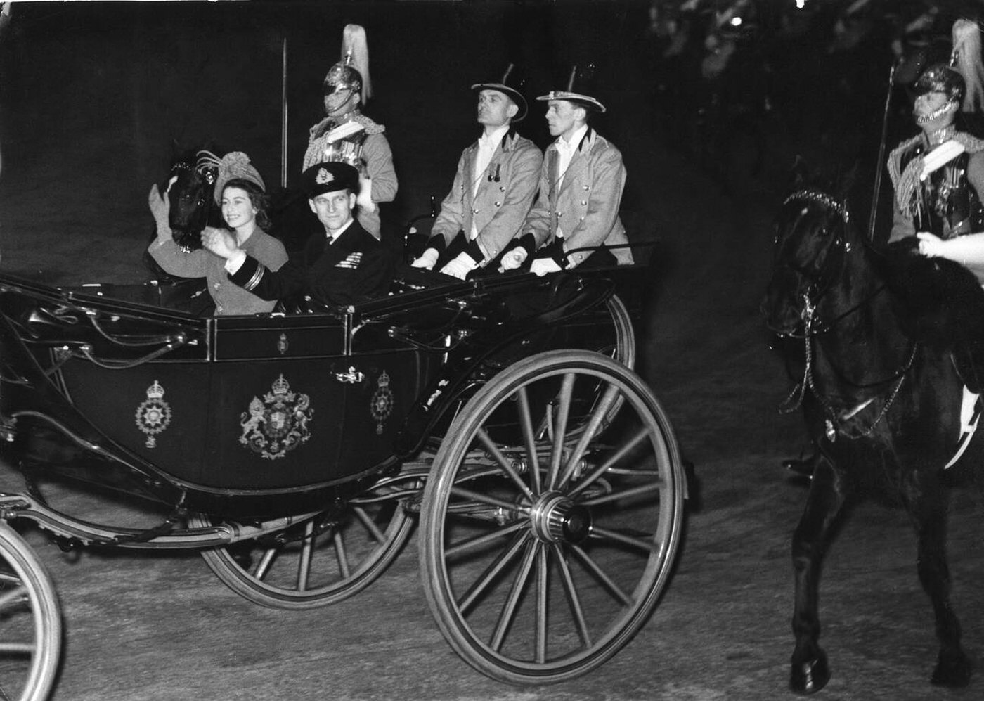 HRH Princess Elizabeth and the Duke of Edinburgh leave Buckingham Palace for their honeymoon, 1947.