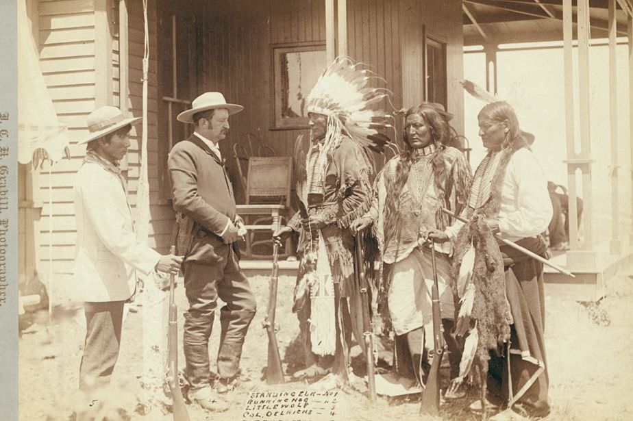 Standing Elk, Running Hog, Little Wolf, Col. Oelrich, and Interpreter, 1890s.