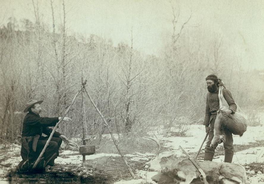"Hunting Deer": Miners McMillan and Hubbard with their game near Deadwood in winter, 1888.