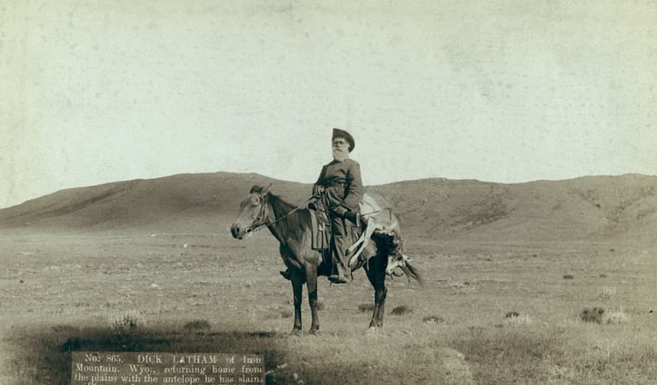 Dick Latham of Iron Mountain, Wyoming, returning home with antelope, 1888.