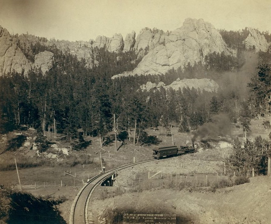 Horse Shoe Curve on Burlington and Missouri River Railway, Buckhorn Mountains in background, 1891.