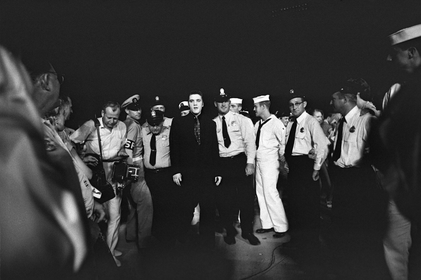 Elvis entering Russwood Park in Memphis for a charitable benefit show, 1956.
